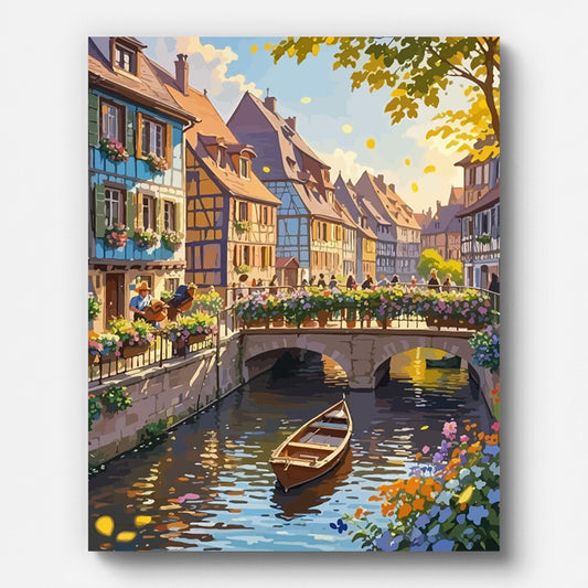 Autumn Town with Bridge Paint by Numbers shown on a stretched canvas