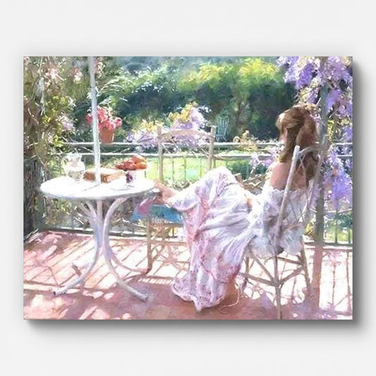Woman Resting in the Garden Paint by Numbers shown on a stretched canvas